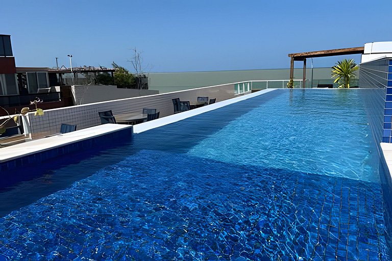 Apto beira-mar com piscina e vista paradisíaca