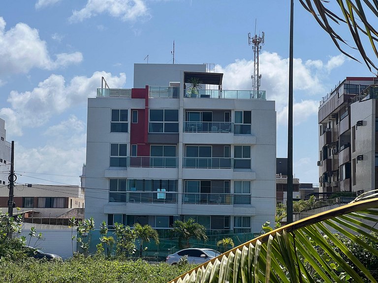 Apto beira-mar com piscina e vista paradisíaca