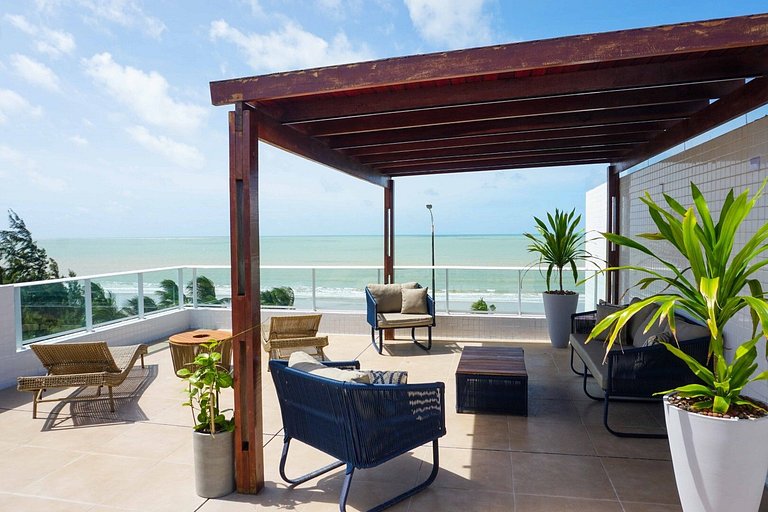 Apto beira-mar com piscina e vista paradisíaca