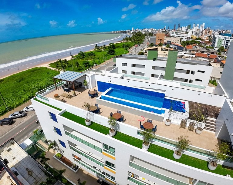 Apto beira-mar com piscina e vista paradisíaca