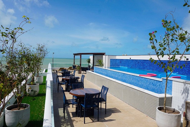 Apto beira-mar com piscina e vista paradisíaca