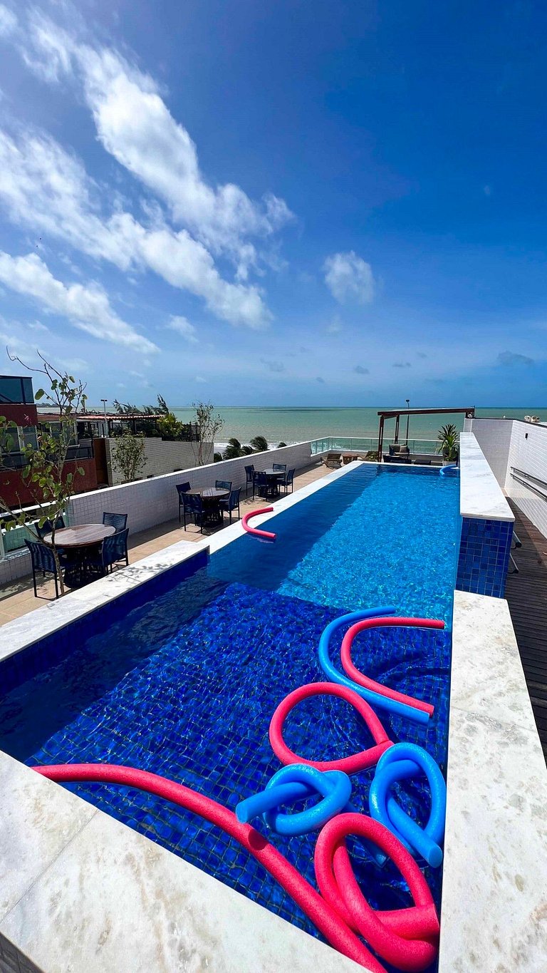 Apto beira-mar com piscina e vista paradisíaca
